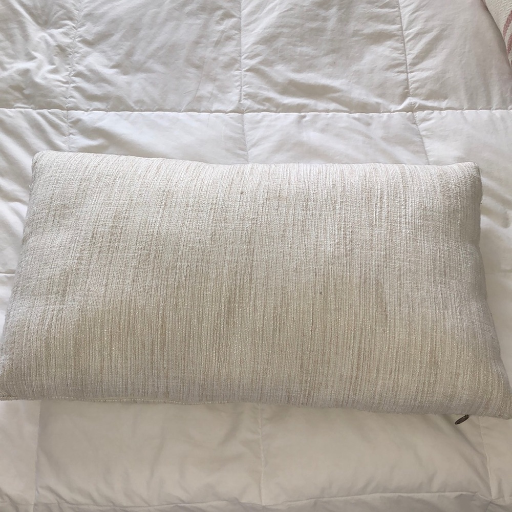 Cute cream throw pillow for bed/couch!